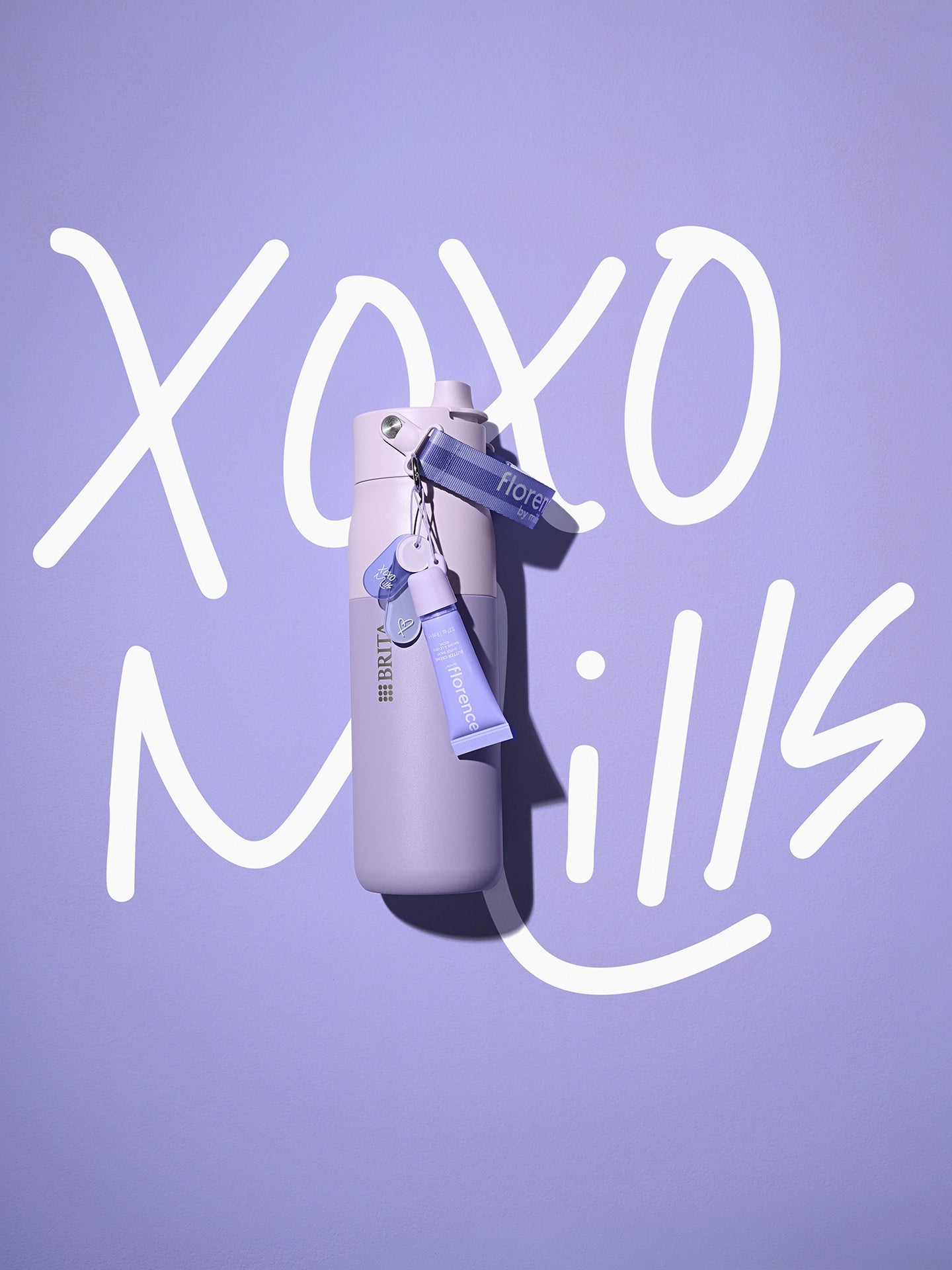 florence by mills x BRITA LARQ bottle on purple background with "XOXO Mills" signature.